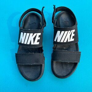 Women's black Nike strap sandals, size 7